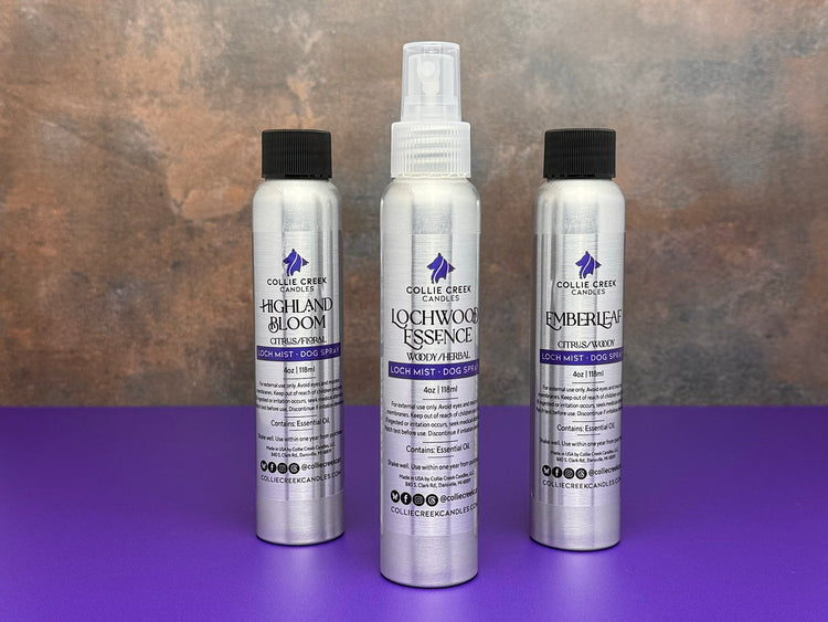 Collection of Loch Mist Dog Spray silver bottles with fine mist spray top. Black tops are shown on two bottles for shipping.