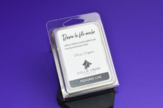 6-cavity recyclable wax melt container holds Bayou la fille moche fragranced wax.