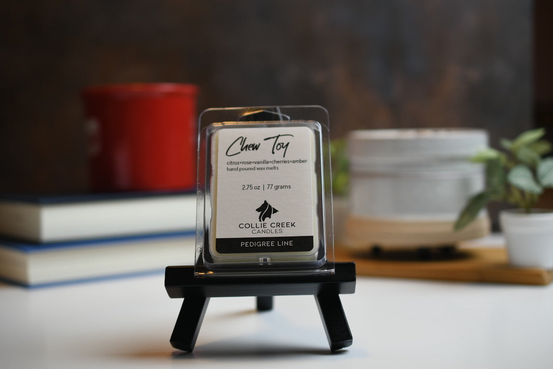 Chew Toy wax melt a 2.75 oz (77 gram) product in a clear plastic clam shell container.