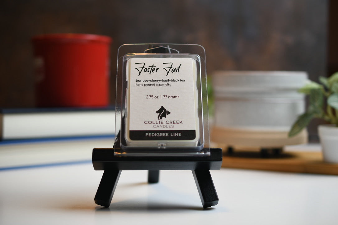 Foster Fail wax melt a 2.75 oz (77 gram) product in a clear plastic clam shell container.