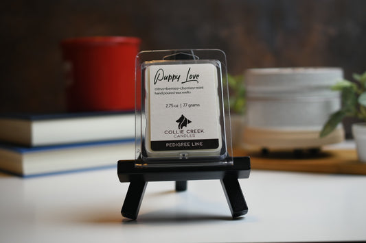 Puppy Love wax melt a 2.75 oz (77 gram) product in a clear plastic clam shell container.