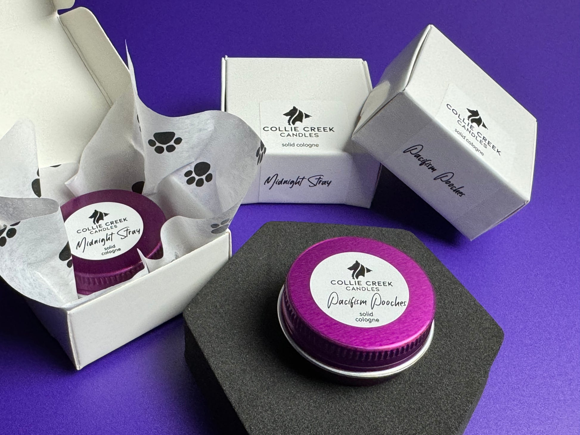 Solid colognes in lavender or patchouli scent in a purple tin and white gift box.