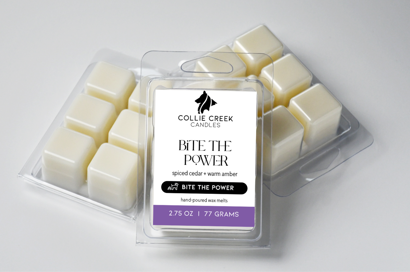 Grouping of 3 naturally colored wax melts. Label is white with black text and reads Bite the Power from the Bite the Power Collection.