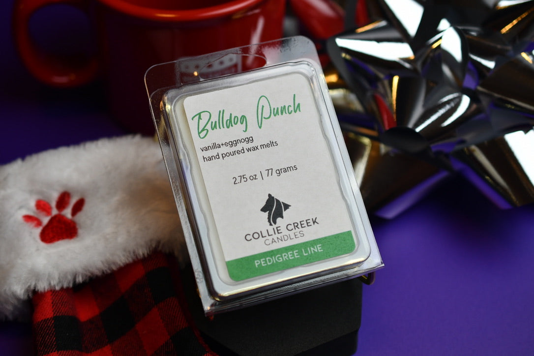Vanilla eggnogg scented Bulldog Punch wax melt in Christmas holiday setting.