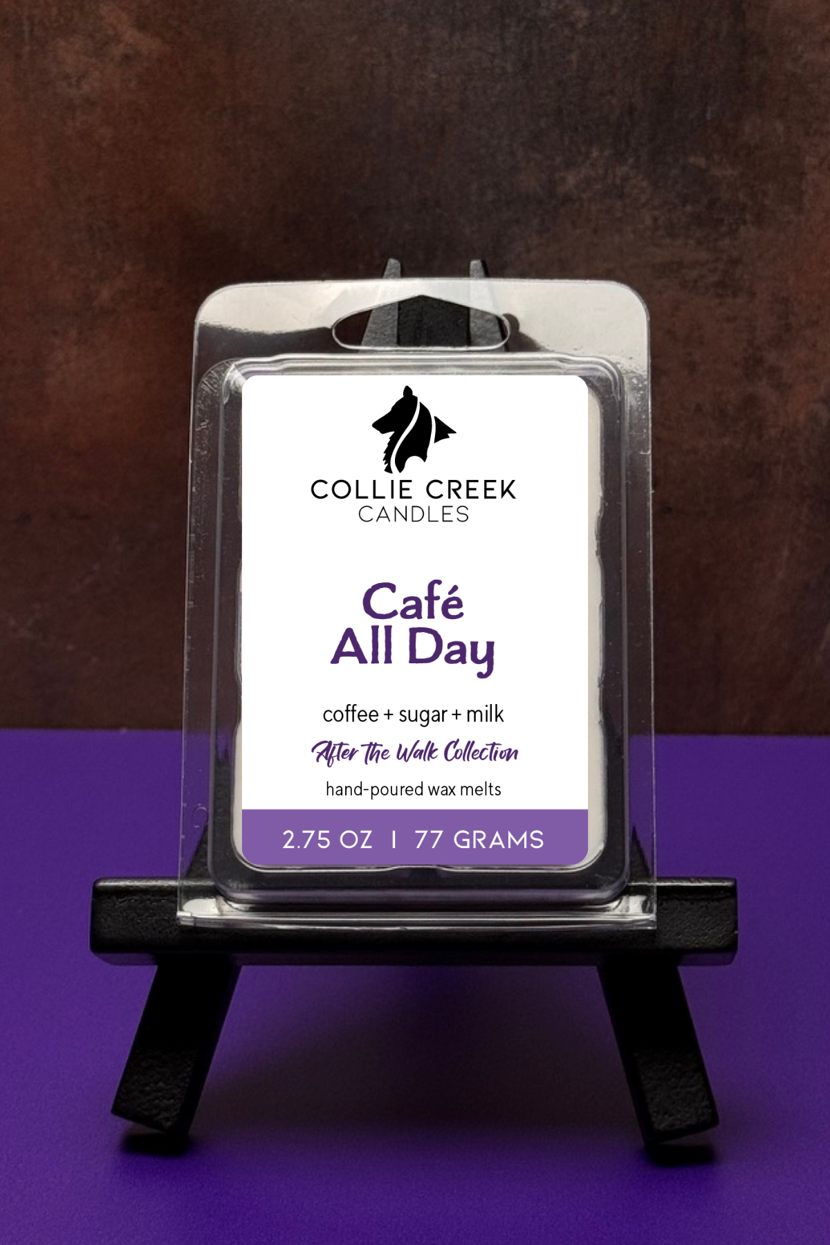 Single wax melt in a clear clam shell, Cafe All Day in purple on the label.