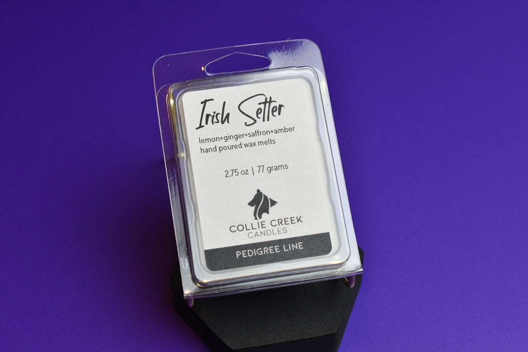 6-cavity recyclable plastic wax melt container holds Irish Setter fragrance on purple background.