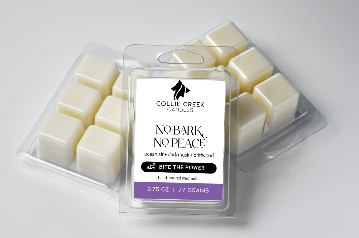 Grouping of 3 naturally colored wax melts. Label is white with black text and reads No Bark, No Peace from the Bite the Power Collection.