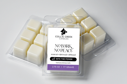 Grouping of 3 naturally colored wax melts. Label is white with black text and reads No Bark, No Peace from the Bite the Power Collection.