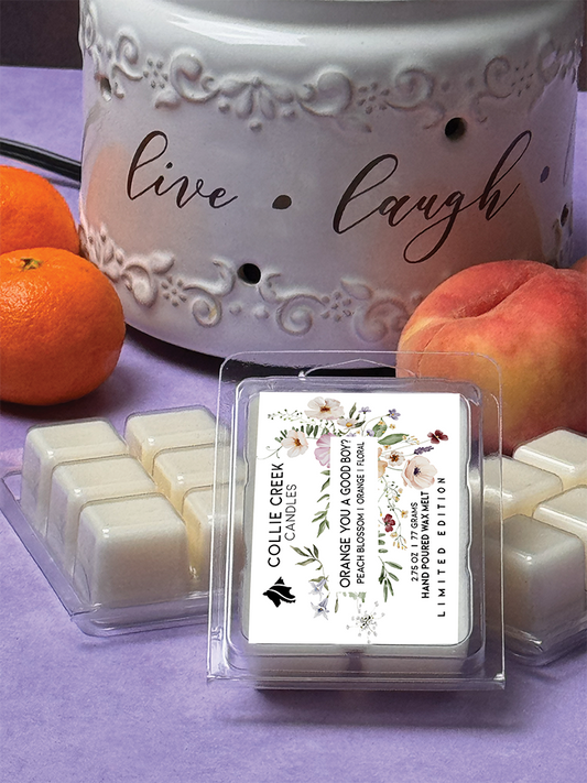 Natural colored wax melts in a 6-cube clam shell with floral label. 2.75 oz, 77 grams, limited edition, peach blossom, orange and floral.